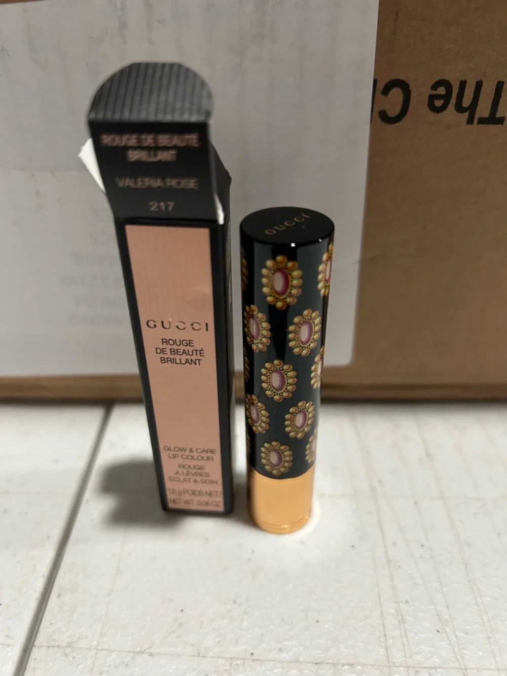 Gucci Lipstick Valeria Rose 217 - Rose Red Bullet with Floral Cap